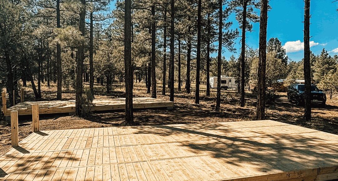 Wooden decks in the forest for use in an RV park.