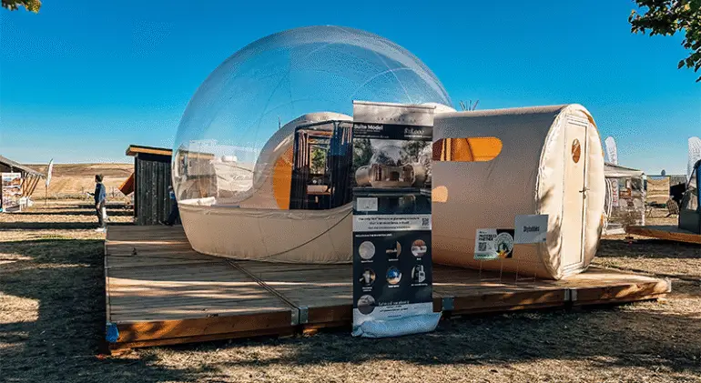 Glamping tent on a wooden deck during the Glamping Show Americas.